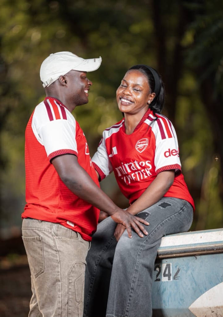 Terrence and Lina laughing together in Arsenal shirts